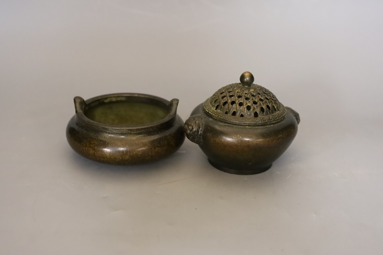 A Chinese bronze tripod censer and a Chinese bronze censer and cover 11cm